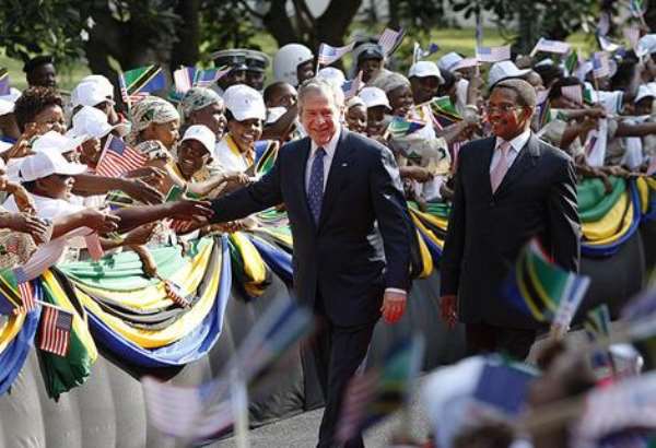Welcome … George Bush greets wellwishers.
Photo: Reuters